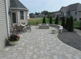 Seat wall, gas fire pit, and patio pavers