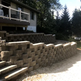 Natural stone walkways and retaining wall planters
