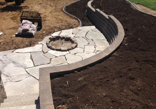 Professional grading and a retaining wall installation, done by Mark Hoerr Landscaping
