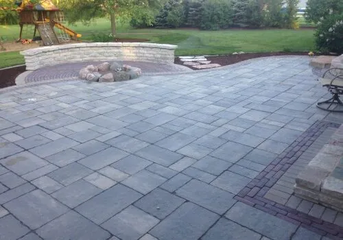 Newly laid paver patio by Mark Hoerr Landscaping for a Dunlap IL home