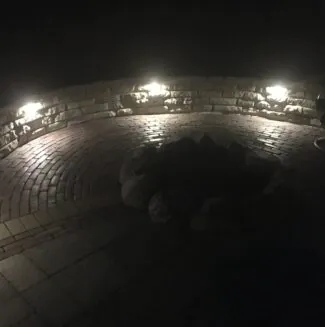 Outdoor lighting along a patio, installed by Mark Hoerr Landscaping