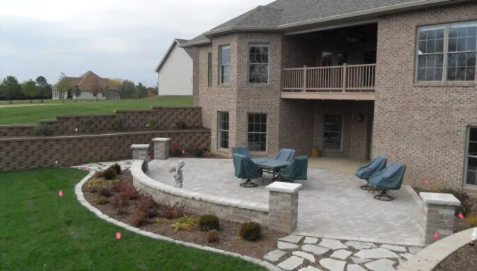 A newly landscaped backyard, with a new paver patio and planting, done by Mark Hoerr Landscaping
