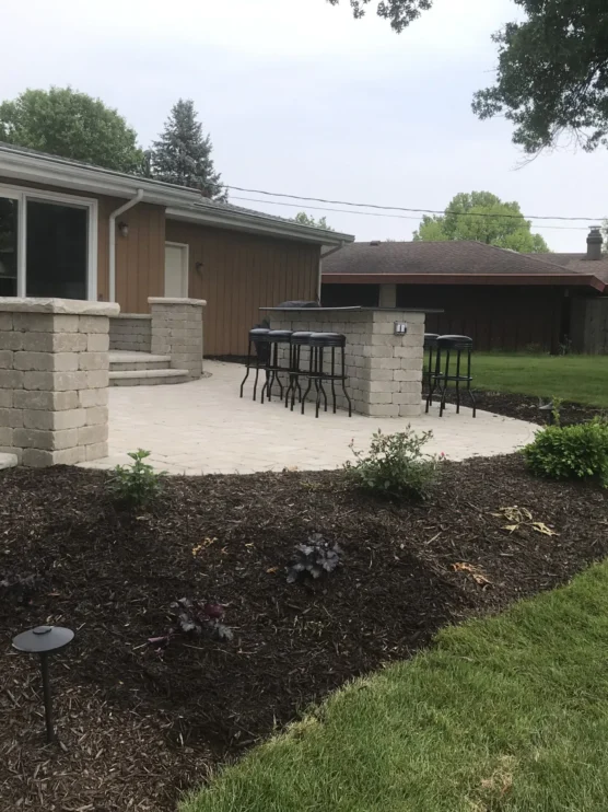 A yard and garden that was recently graded, thanks to the professionals at Mark Hoerr Landscaping in Peoria, IL