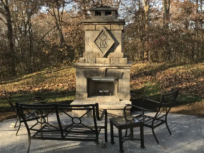 An outdoor fireplace, installed by Mark Hoerr Landscaping, part of their outdoor living solutions