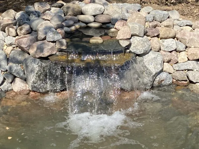 Running pound and waterfall, part of the water features Mark Hoerr can install for Peoria residents