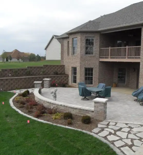 An aerial shot of a home's exterior, with landscaping and ground work done by Mark Hoerr Landscaping