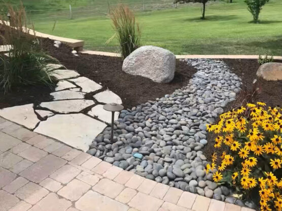 Backyard hardscape by landscaper in Peoria IL.